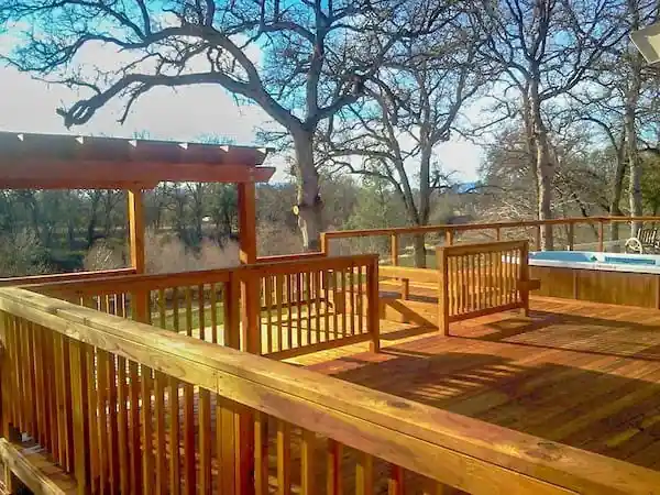 Deck railing built around a mature oak
